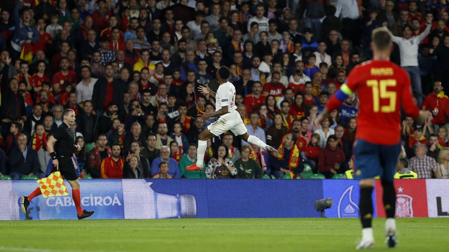 England&#039;s Raheem Sterling celebrates after scoring the opening goal of his team during the UEFA Nations League soccer match between Spain and England at Benito Villamarin stadium, in Seville, Spa ...