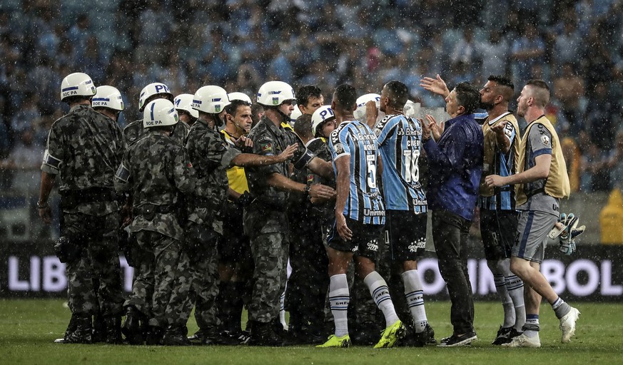 epa07132248 Players of Gremio react after losing against River Plate in the second leg of the Copa Libertadores semifinal between Gremio of Brazil and River Plate of Argentina at Arena del Gremio in P ...