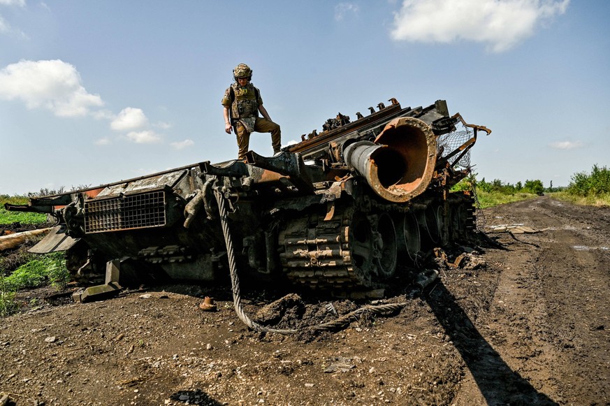 Novodarivka Village Liberated - Ukraine A press officer who goes by callsign Damian stands on top of a destroyed Russian military vehicle in Novodarivka village, Zaporizhzhia Region, southeastern Ukra ...