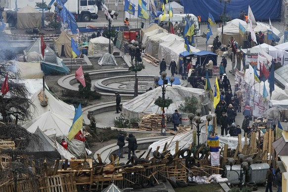 Ein Lager der pro-europäischen Protestbewegung in Kiev. Vergangenen Mittwoch beschloss das Parlament neue Demonstrationsgesetze, die unter anderem das unbewilligte Aufstellen von Zelten mit Freiheitss ...