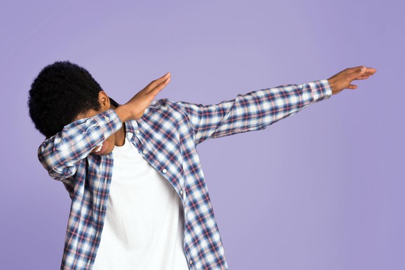 Black guy making dab gesture on pink studio background Black guy making dab gesture, having fun on pink studio background, model released, , 59881462.jpg RECORD DATE NOT STATED