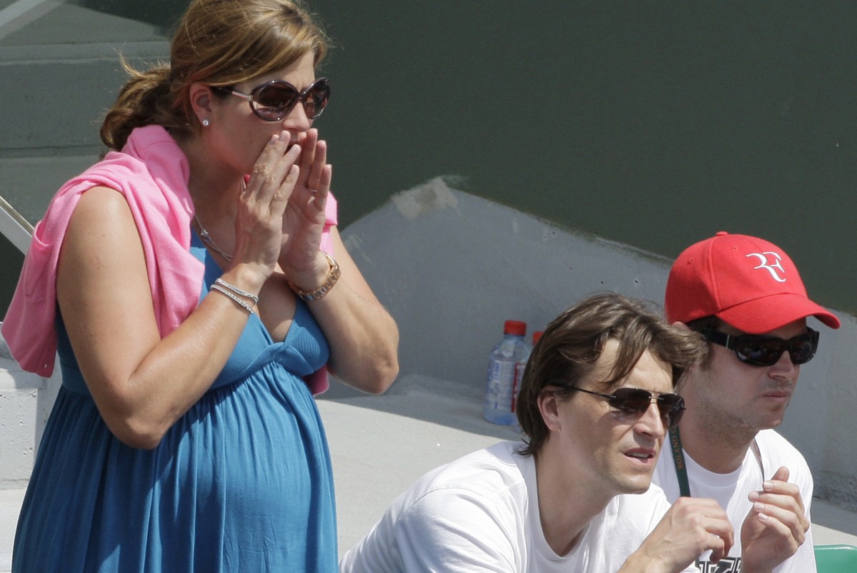 Mirka Vavrinec, the wife of Switzerland's Roger Federer, yells as she watches her husband play his fourth round match against Germany's Tommy Haas at the French Open tennis tournament at the ...