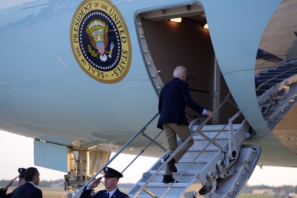 President Joe Biden boards Air Force One as he departs Joint Base Andrews, Md., on his way to Tampa, Fla, to visit the Hurricane Milton affected areas, Sunday, Oct. 13, 2024. (AP Photo/Manuel Balce Ce ...