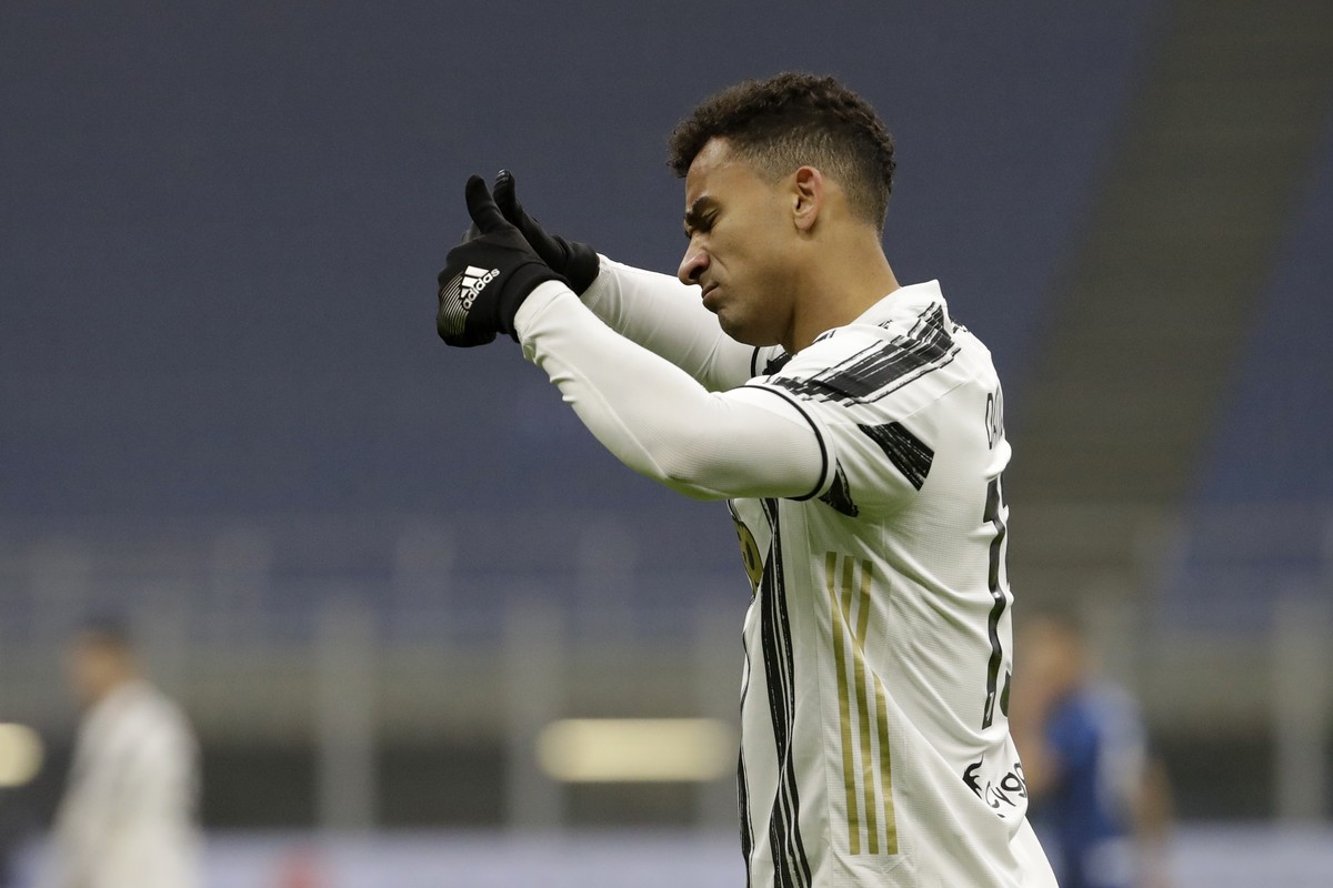 Juventus' Danilo reacts during the Italian Cup semi-final first leg soccer match between Inter Milan and Juventus at the San Siro stadium, in Milan, Italy, Tuesday, Feb. 2, 2021. (AP Photo/Luca B ...
