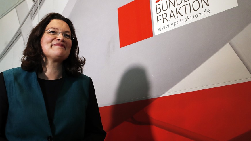 epa06229925 The new designated chairwoman of the German Socialist Democratic Party (SPD) parliamentary group, Andrea Nahles (R) speaks in a press conference next to the former chairman, Thomas Opperma ...