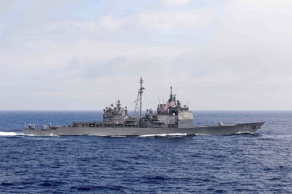 The guided-missile cruiser USS Chancellorsville (CG 62) transits the Philippine Sea, June 18, 2016. The U.S. Navy is sailing the USS Chancellorsville and the USS Antietam warships through the Taiwan S ...