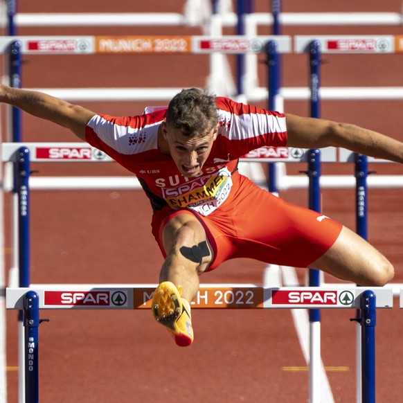 Switzerland's Simon Ehammer competes in the Men's decathlon 110 meters hurdles during the athletics competition in the Olympic Stadium at the European Championships in Munich, Germany, Tuesday, Aug. 1 ...