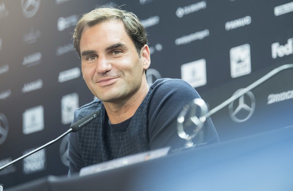 Tennis Player Roger Federer attends a news conference during the Mercedes Cup ATP World Tour tournament in Stuttgart, Germany, Monday, June 11, 2018. (Sebastian Gollnow/dpa via AP)