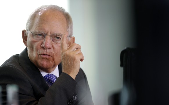 FILE - In this Nov. 5, 2014 file picture German Finance Minister Wolfgang Schaeuble gestures during a cabinet meeting in Berlin. s German Finance Minister Wolfgang Schaeuble on Sunday March 1, 2015 to ...