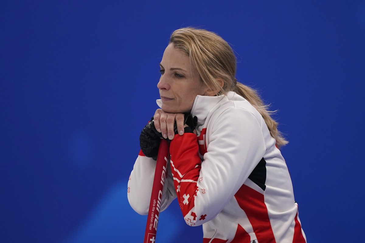 Switzerland's Silvana Tirinzoni rests on her curling broom during the women's curling bronze medal match between Sweden and Switzerland at the Beijing Winter Olympics Saturday, Feb. 19, 2022 ...