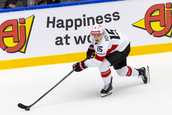 Switzerland&#039;s forward Gregory Hofmann controls the puck, during the IIHF 2025 World Championship preliminary round group B game between Denmark and Switzerland, at the Jyske Bank Boxen, in Hernin ...