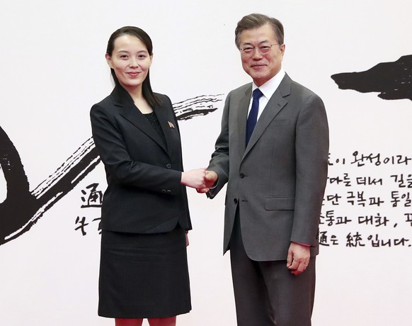 South Korean President Moon Jae-in, right, shakes hands with Kim Yo Jong, North Korean leader Kim Jong Un&#039;s sister, at the presidential house in Seoul, South Korea, Saturday, Feb. 10, 2018. A rar ...