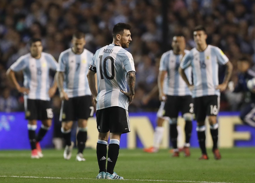 epa06247236 Lionel Messi (C) of Argentina looks on after the 2018 FIFA World Cup Conmebol qualification match between Argentina and Peru at La Bombonera Stadium in Buenos Aires, Argentina, 05 October  ...