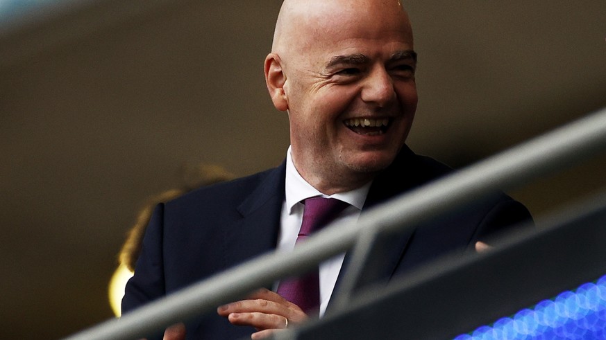 epa09338261 FIFA president Gianni Infantino (L) talks to the Italian President Sergio Mattarella before the UEFA EURO 2020 final between Italy and England in London, Britain, 11 July 2021. EPA/John Si ...