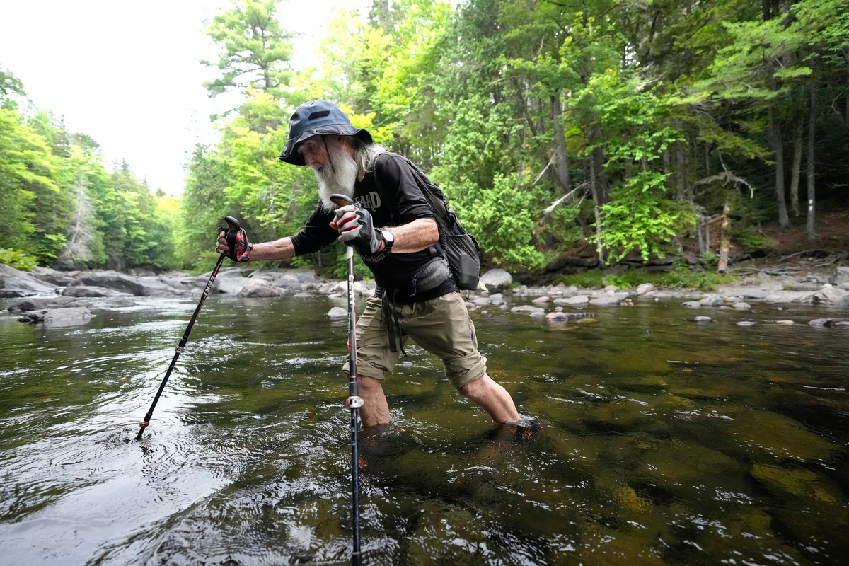 Appalachian Trail hiker Dale Sanders wades across Big Wilson Stream on the 100-Mile Wilderness north of Monson, Maine, Wednesday, July 29, 2026. (AP Photo/Robert F. Bukaty)
Dale Sanders