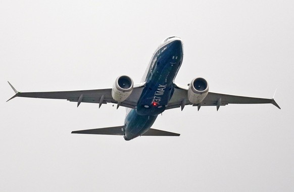 FILE - In this Wednesday, Sept. 30, 2020, file photo, a Boeing 737 Max jet, piloted by Federal Aviation Administration (FAA) chief Steve Dickson, takes off on a test flight from Boeing Field in Seattl ...