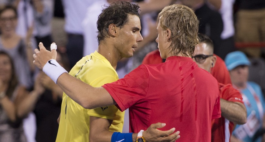 Rafael Nadal, of Spain, congratulates Denis Shapovalov, of Canada, on his 3-6, 6-4, 7-6 (4) win at the Rogers Cup tennis tournament Thursday, Aug. 10, 2017, in Montreal. (Paul Chiasson/The Canadian Pr ...