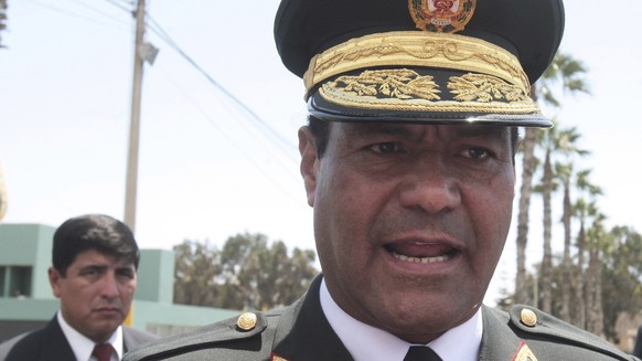 In this photo provided by the government news agency Andina and taken in Nov. 3, 2016, Gen. Raul Becerra, former head of the national police force, speaks to reporters after attending a police ceremon ...