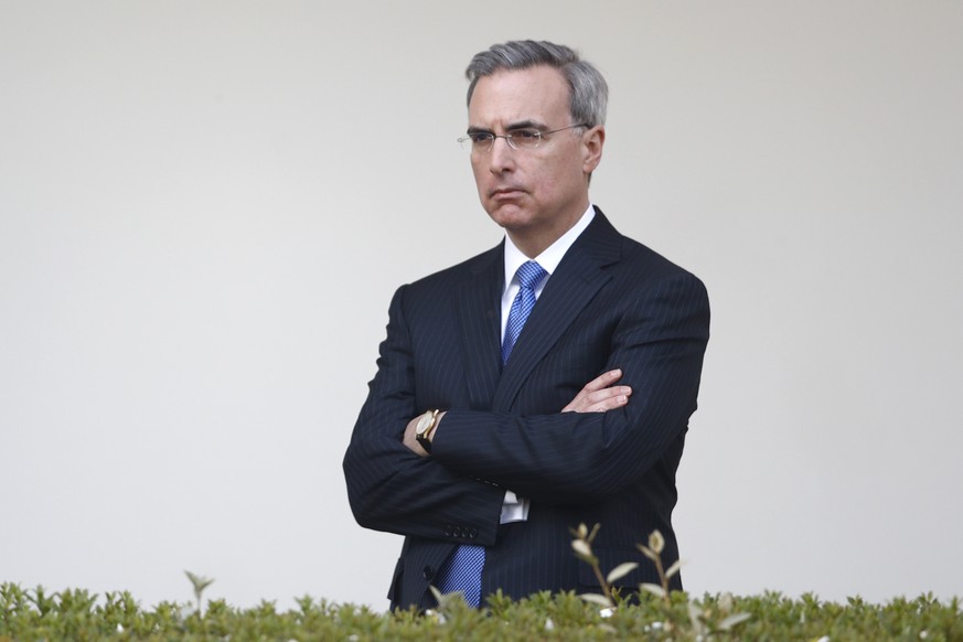 FILE - White House counsel Pat Cipollone listens as President Donald Trump speaks during a coronavirus task force briefing in the Rose Garden of the White House, March 29, 2020, in Washington. Cipollo ...