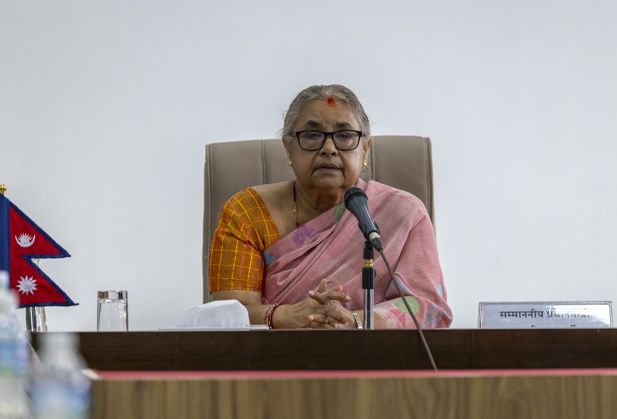 epa12375457 Nepal's new Interim Prime Minister Sushila Karki attends a briefing meeting with the Nepalese government's secretariats and security heads during her first day at the prime minis ...