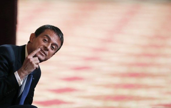 FILE - In this Sept. 7, 2015 file photo, French Prime Minister Manuel Valls gesture before French President Francois Hollande&#039;s press conference at the Elysee Palace in Paris, France, Monday Sept ...