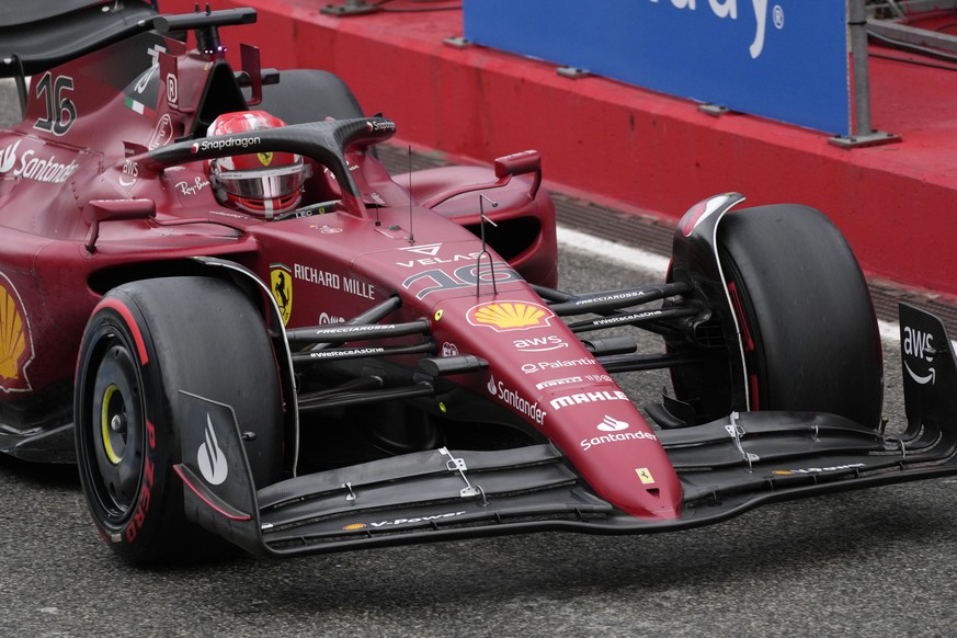 Ferrari driver Charles Leclerc of Monaco steers his car after stopping at pit during the Emilia Romagna Formula One Grand Prix, at the Enzo and Dino Ferrari racetrack, in Imola, Italy, Sunday, April 2 ...