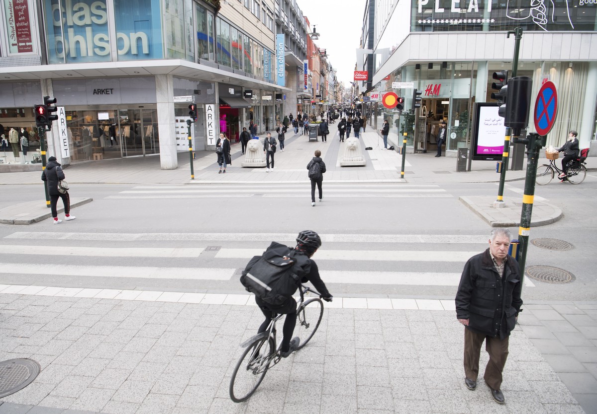 epa08337192 General view of the beginning of the popular pedestrian Drottninggatan ('Queen's Street') in Stockholm, Sweden, 01 April 2020. The streets of the Swedish capital are less cr ...