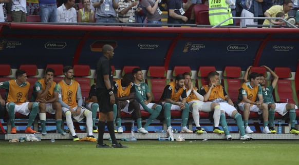 Germany players sit on the bench during the group F match between South Korea and Germany, at the 2018 soccer World Cup in the Kazan Arena in Kazan, Russia, Wednesday, June 27, 2018. (AP Photo/Thanass ...