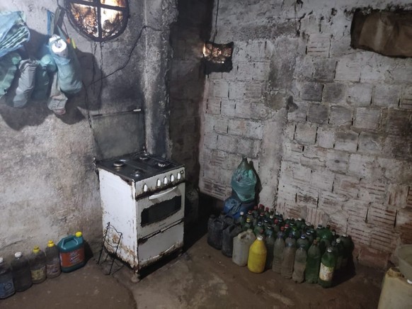 epa10097556 A handout photo made available by the Rio de Janeiro Military Police showing the place where a man held captive a woman and her two children for 17 years, in Rio de Janeiro, Brazil, 29 Jul ...