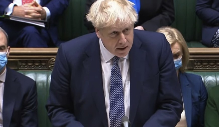 In this grab taken from video, Britain's Prime Minister Boris Johnson makes a statement ahead of Prime Minister's Questions in the House of Commons, London, Wednesday, Jan. 12, 2022. Johnson has apolo ...