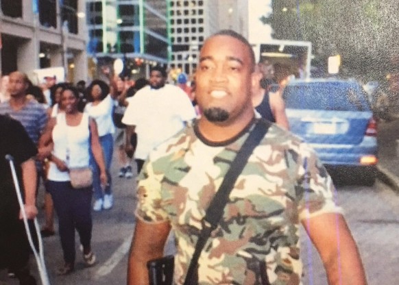 epa05414347 A handout picture released by the Dallas Police Department shows a possible suspect in the shooting of multiple police officers during a protest in Dallas, Texas, USA, 07 July 2016. Accord ...