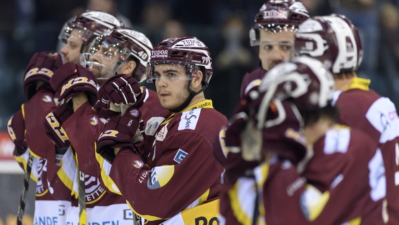 La deception des joueurs Genevois, lors du 4eme match du quart de finale de play off du championnat suisse de hockey sur glace de National League LNA, entre le Geneve Servette HC et le EV Zug, ce same ...