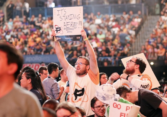 In this Friday, July 27, 2018, file photo, Philadelphia Fusion fan holds up a sign during the Overwatch League Grand Finals&#039; first night of competition at the Barclays Center in the Brooklyn boro ...