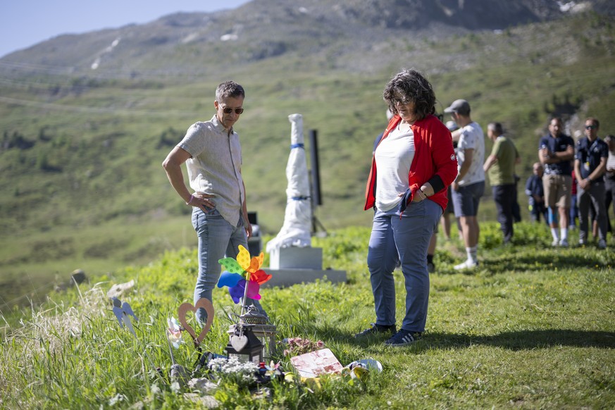 Gino&#039;s father Andreas, left, and Gino&#039;s mother Sandra, right, during a commemoration for Swiss rider Gino Maeder on the Albula pass prior the fifth stage at the 88th Tour de Suisse UCI World ...