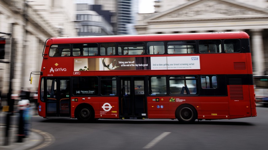 epa12031550 A bus drives through the City of London financial district, London, Britain, 14 April 2025. The FTSE 100, the United Kingdom&#039;s most prominent stock market index listed on the London S ...