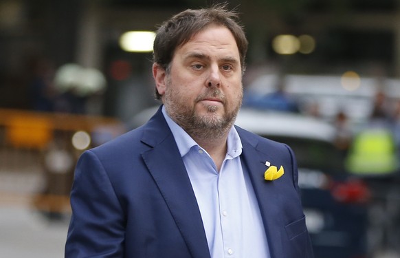 Former Catalan Vice President Oriol Junqueras arrives at the National Court for questioning by a National Court judge investigating possible rebellion charges, in Madrid, Spain, Thursday Nov. 2, 2017. ...
