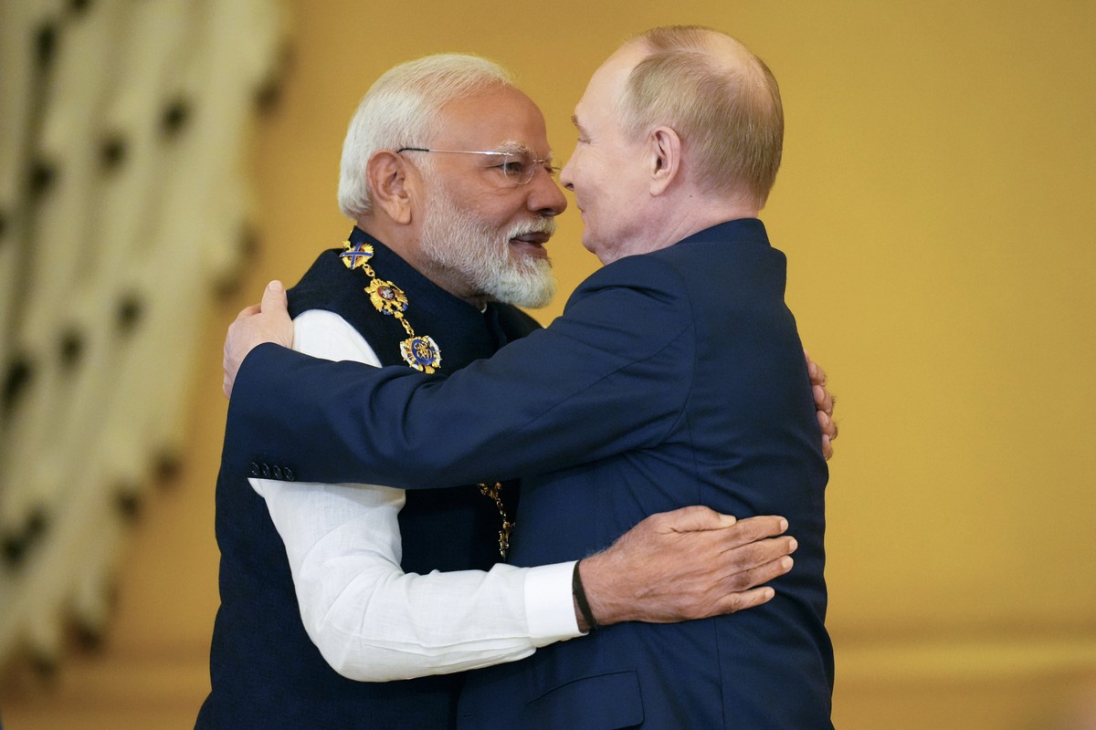 FILE- Russian President Vladimir Putin, right, awards Indian Prime Minister Narendra Modi with the Order of St. Andrew the Apostle the First-Called at the Kremlin in Moscow, Russia, July 9, 2024. (AP  ...