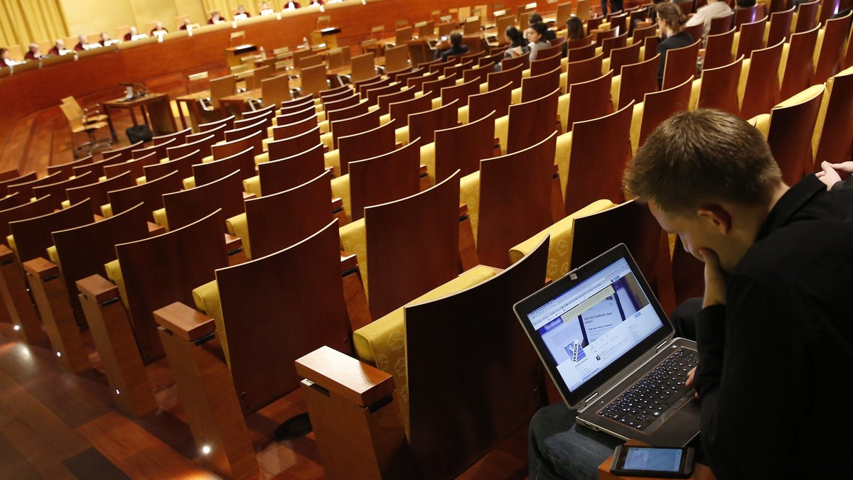 epa04965340 Austrian Max Schrems waits for the verdict of the European Court of Justice in Luxembourg, 06 October 2015. Max Schrems filed a data privacy infringement lawsuits against Facebook, the onl ...