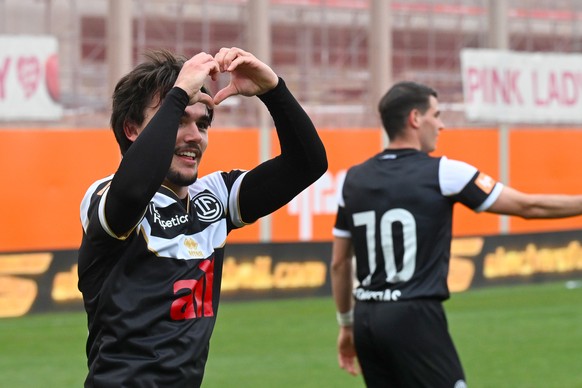 Martim Marques (LUG), left, celebrates the 1 - 0 goal, during the Super League soccer match FC Lugano against FC St. Gallen at the Cornaredo Stadium in Lugano, Sunday, April 13, 2025. (KEYSTONE/Ti-Pre ...