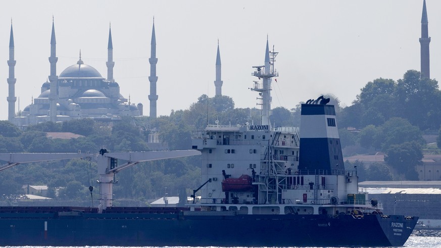 The cargo ship Razoni crosses the Bosphorus Strait in Istanbul, Turkey, Wednesday, Aug. 3, 2022. The first cargo ship to leave Ukraine since the Russian invasion was anchored at an inspection area in  ...
