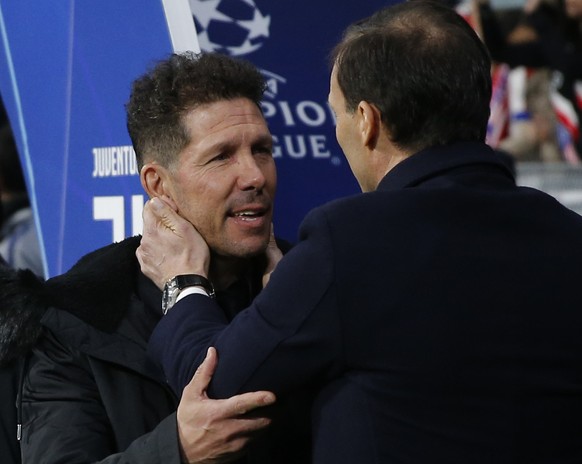 Juventus coach Massimiliano Allegri and Atletico coach Diego Simeone speak ahead of the Champions League round of 16 first leg soccer match between Atletico Madrid and Juventus at Wanda Metropolitano  ...