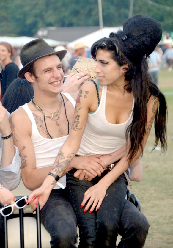 (EXCLUSIVE, Premium Rates Apply) Amy Winehouse (right) and husband Blake Fielder-Civil (Photo by Jon Furniss/WireImage)