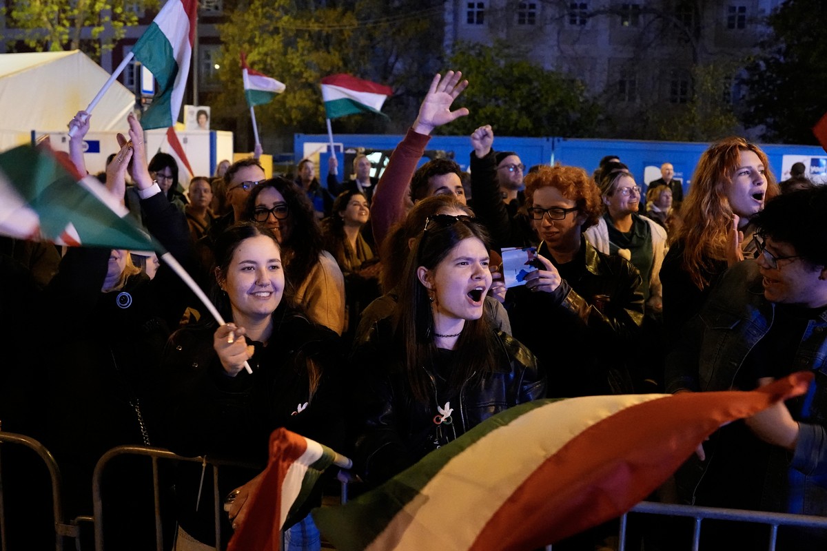 Supporters of Peter Magyar, the leader of the opposition Tisza party celebrate after a parliamentary election in Budapest, Hungary, Sunday, April 12, 2026. (AP Photo/Darko Bandic)
Hungary Election