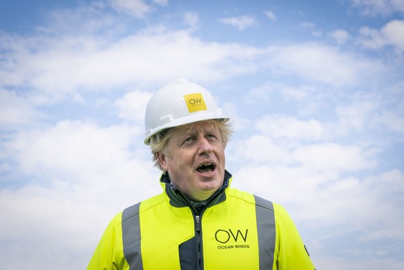 Britain&#039;s Prime Minister Boris Johnson speaks, onboard the Esvagt Alba during a visit to the Moray Offshore Windfarm East, off the Aberdeenshire coast, Scotland, Thursday, Aug. 5, 2021. (Jane Bar ...