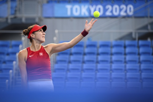 epa09361388 Belinda Bencic of Switzerland serves against Jessica Pegula of the USA during the women&#039;s single tennis first round match at the Tokyo 2020 Olympic Games, at Ariake Tennis Park in Tok ...