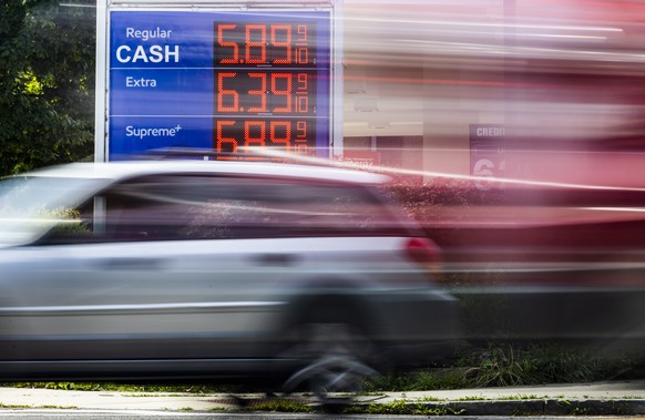 epa10006188 A car drives by an Exxon gas station displaying its prices in Washington DC, USA, 10 June 2022. According to the Consumer Price index, gas prices in May brought inflation numbers to their  ...