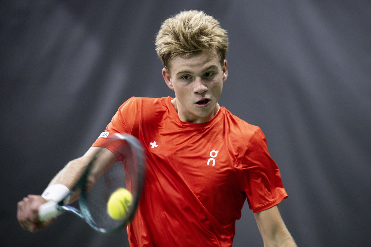 epa12373516 Switzerland's Henry Bernet in action against India's Sumit Nagal during the third single match of the Davis Cup World Group I round between Switzerland and India at the Swiss Ten ...