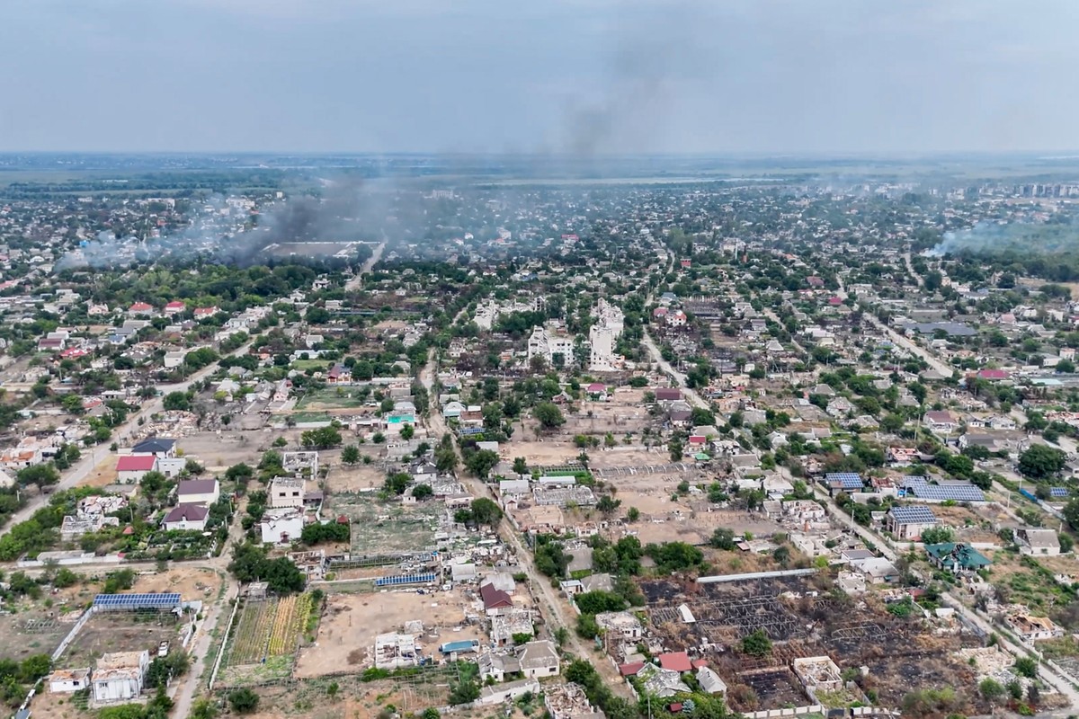 In this undated image from video provided by the Ukrainian 34th Separate Marine Brigade "Borysfen" on Sept. 22, 2026, smoke rises from a residential neighborhood in the Russian-occupied city ...