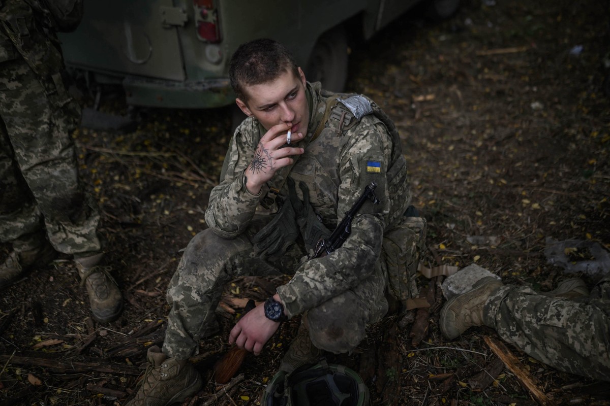 (FILES) Infantry recruit Mykola Lebedev, 18, of the 28th Seperate Mechanized Brigade smokes during a break as he undergoes a basic training course at an undislosed location in eastern Ukraine on Octob ...