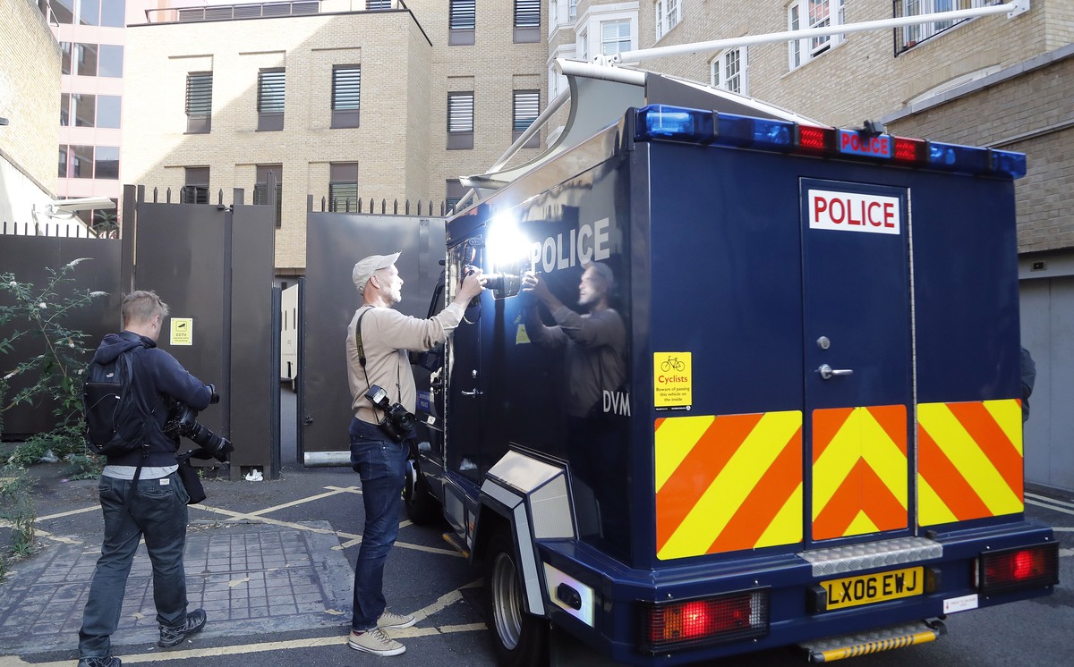 An armored police vehicle, believed to contain Salih Khater, drives into the car park at Westminster Magistrates court in London, Monday, Aug. 20, 2018. The Metropolitan Police force said 29-year-old  ...